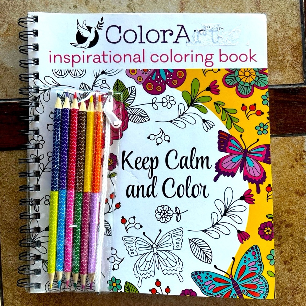 ColorArt adult coloring book with colored pencils.